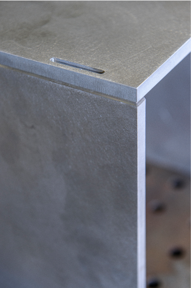Furniture joint detail showing mortise and tenon connection.
